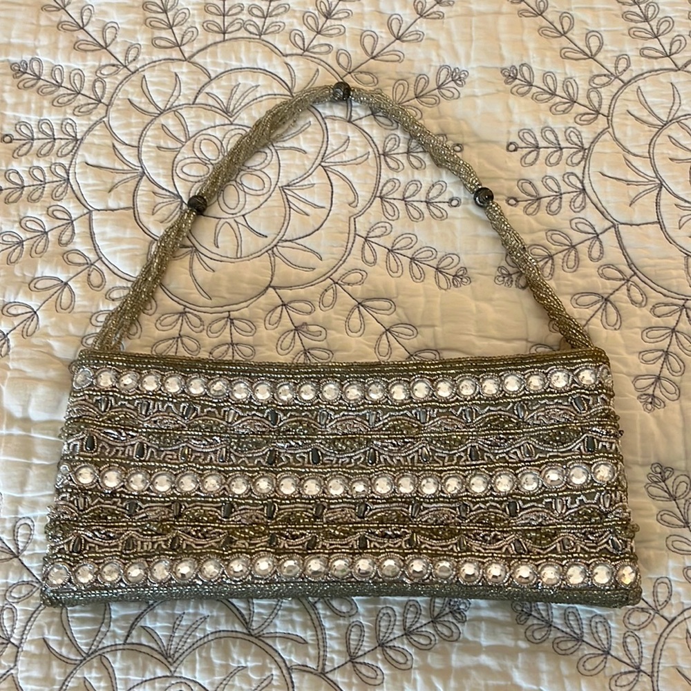 Silver beaded evening bag. 9”x4”x1.5”.